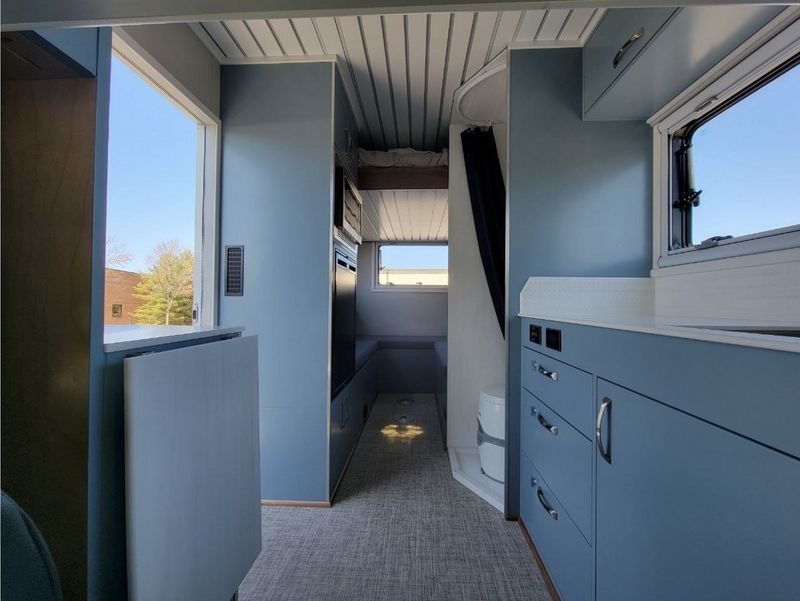 Picture 1/12 of a Adjustable Bed in Cutaway Box Camper – Lots of Amenities for sale in Frederick, Maryland