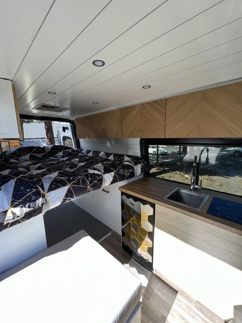 Picture 1/16 of a NEW 2022 144 diesel Sprinter Foldable bed / 12v A/C / shower for sale in Big Bear City, California