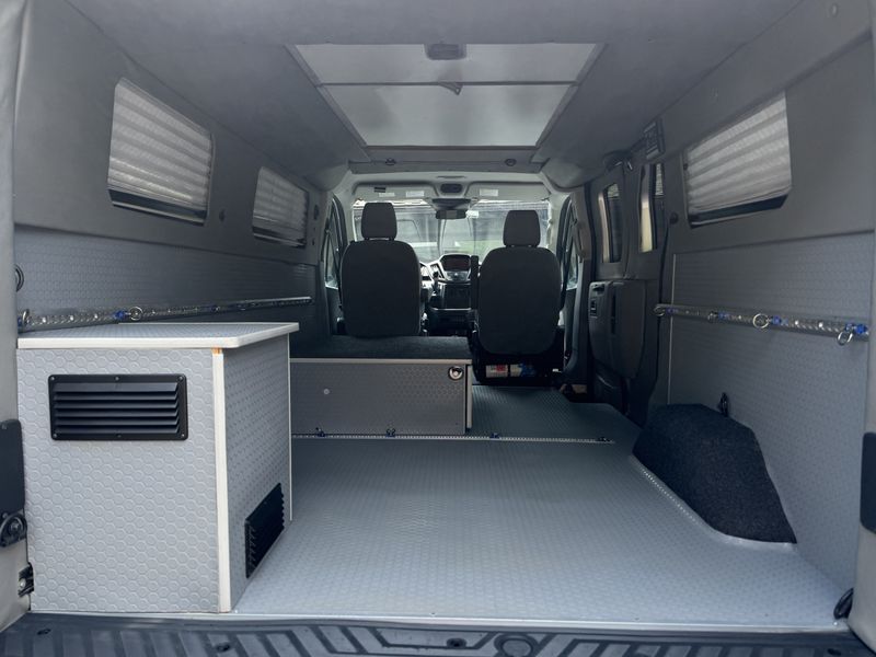 Picture 5/16 of a 2016 Ford Transit 150, Quigley 4x4, SportsMobile part. conv. for sale in Ithaca, New York