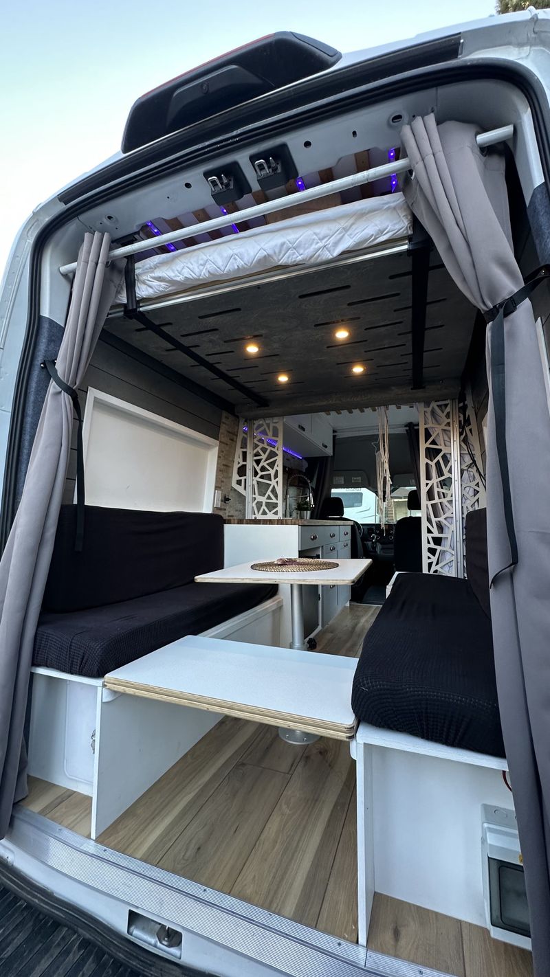 Picture 5/22 of a NEW Camper van with ELEVATOR bed & indoor fold away bathroom for sale in Big Bear City, California