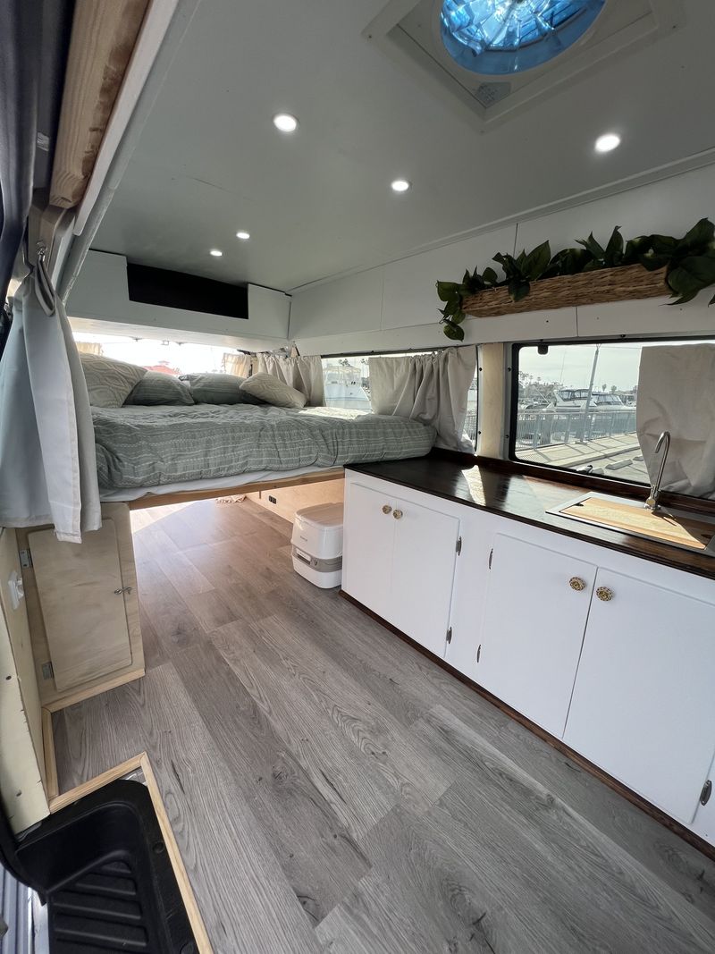 Picture 1/25 of a 2007 Ford Econoline E-350 Hightop Brand New Conversion!! for sale in Huntington Beach, California