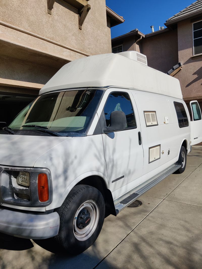 Picture 1/15 of a 2000 GMC savanna 2500 conversion van for sale in Modesto, California