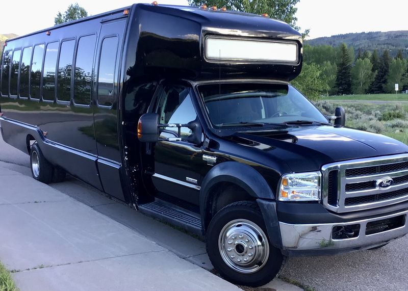 Picture 2/14 of a rare factory 4x4 2006 Ford F-550 Krystal Koach shuttle bus for sale in Aspen, Colorado