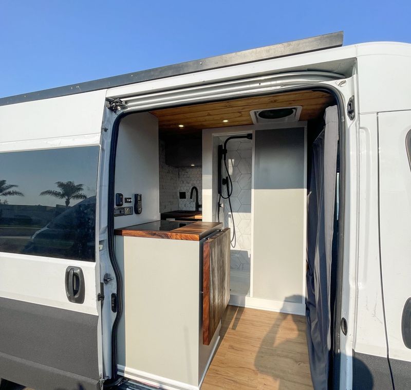 Picture 1/20 of a NEW Factory Engine! Bed Lift, Shower, and 600 Amp Hours for sale in San Diego, California