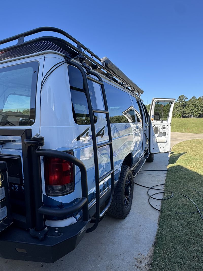 Picture 5/8 of a 2013 Ford 4x4 E350 quigley for sale in Bracey, Virginia