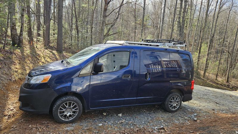 Picture 3/9 of a 2014 Nissan micro camper with solar for sale in East Flat Rock, North Carolina