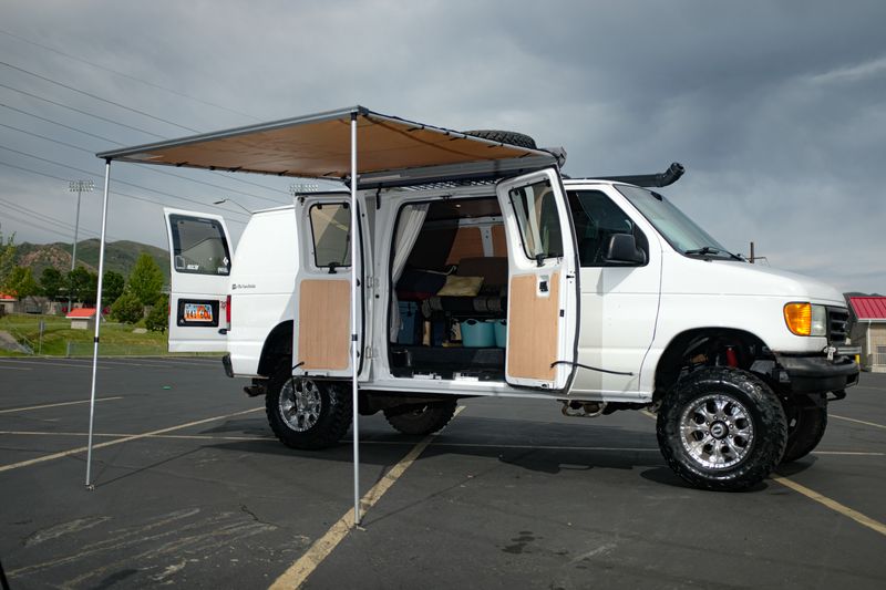 Picture 1/13 of a 1999 Ford E-250 4x4 Adventure Van for sale in Salt Lake City, Utah