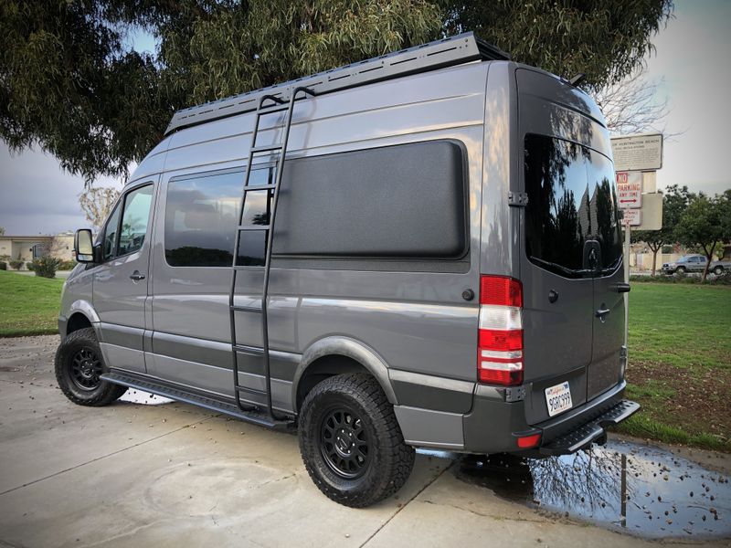 Picture 4/23 of a 4x4 Sprinter family camper for sale in Huntington Beach, California