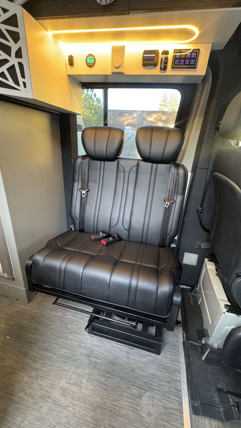 Picture 4/30 of a 144 Sprinter van / warranty / shower / sits 5 / bed lift for sale in Big Bear City, California
