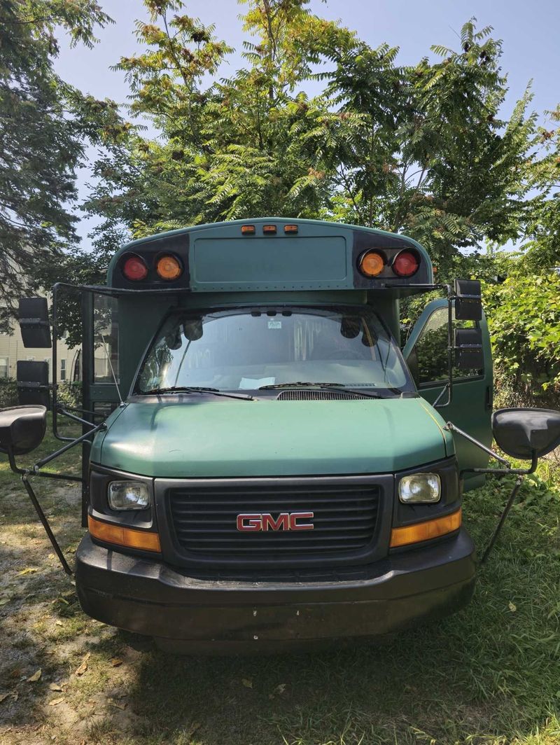 Picture 1/16 of a 2009 GMC 3500 Skoolie for sale in Lawrence, Massachusetts