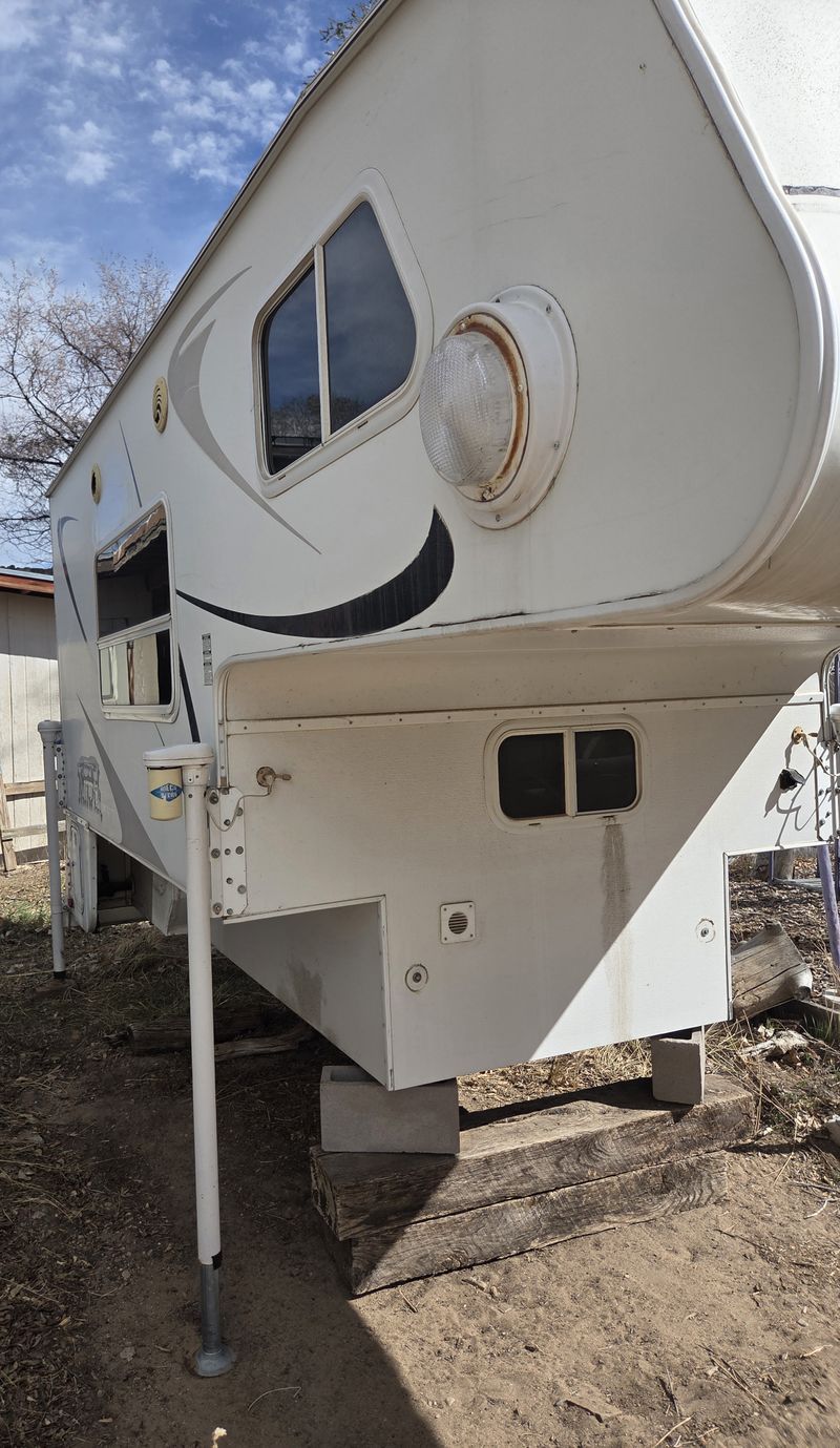 Picture 1/4 of a Slide in truck camper for sale in Santa Fe, New Mexico