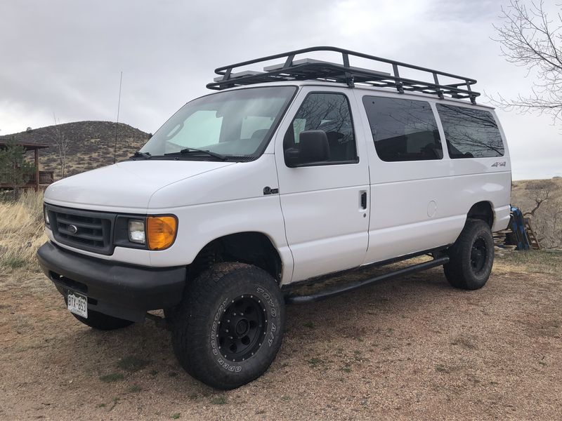 Picture 1/13 of a 2007 Ford E-350 Econoline 4x4 Quigley Conversion Camper Van for sale in Loveland, Colorado