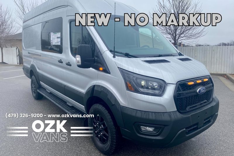 Picture 1/6 of a 2023 NEW Ingot Silver Ford Transit 350 Trail High-Roof AWD for sale in Fayetteville, Arkansas