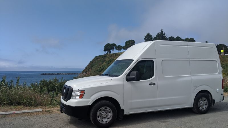 Picture 1/12 of a 2013 Nissan NV 2500 V8 High Top Custom conversion for sale in East Lansing, Michigan