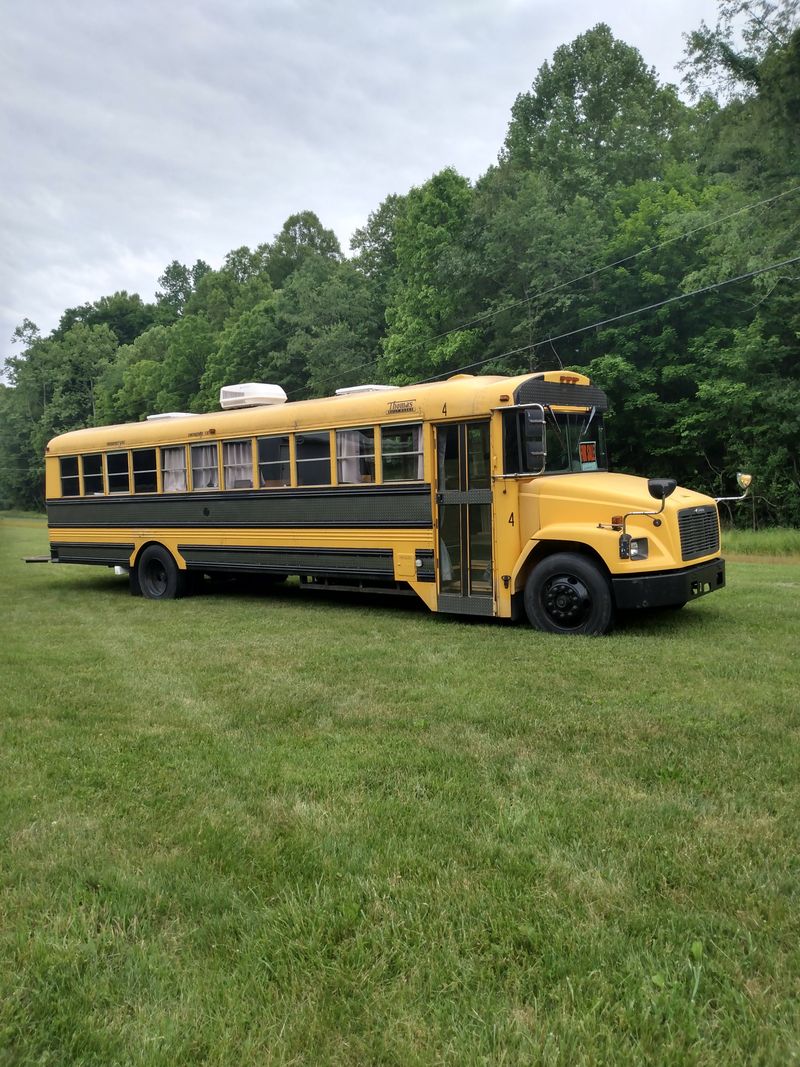 Picture 1/15 of a 2004 f65 Thomas converted skoolie for sale in Logan, Ohio