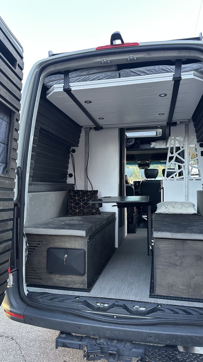Picture 5/18 of a 144 Sprinter sits & sleeps 5 / ELEVATOR BED / bathroom / A/C for sale in Big Bear City, California