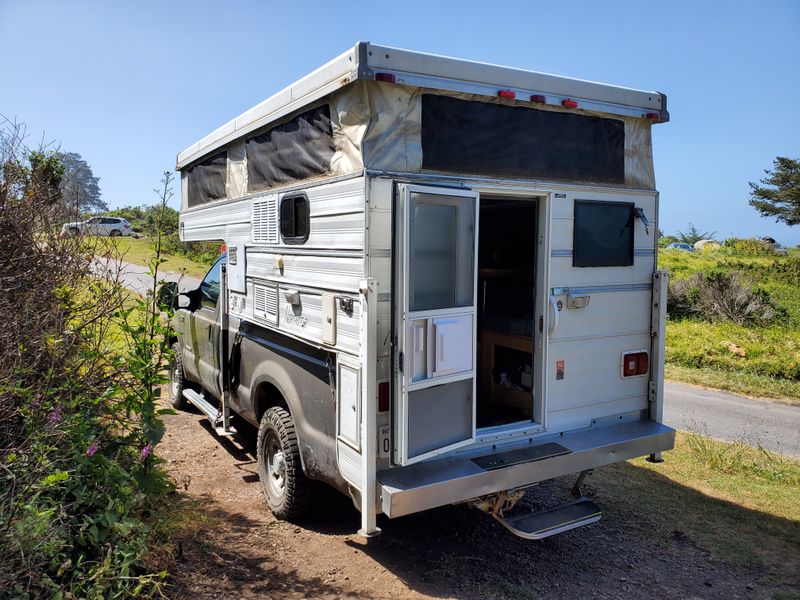 Picture 3/22 of a 04 F-250 4WD w/ pop up truck camper for sale in Seattle, Washington