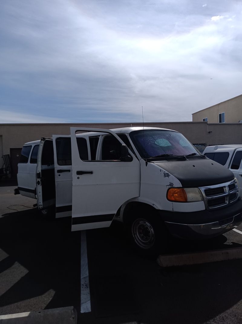 Picture 5/10 of a 2001 Chevy wagon converted with queen bed for sale in El Cajon, California