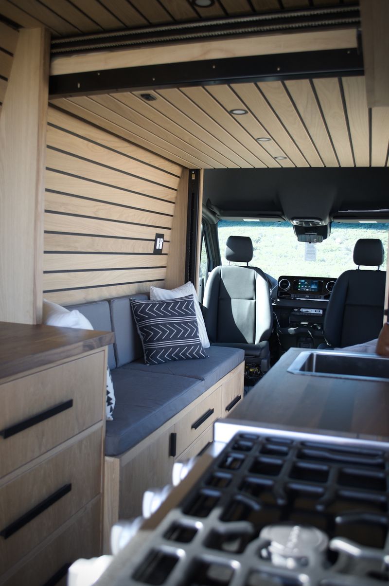 Picture 2/21 of a Custom 4x4 Sprinter with bed lift for sale in Newport Beach, California