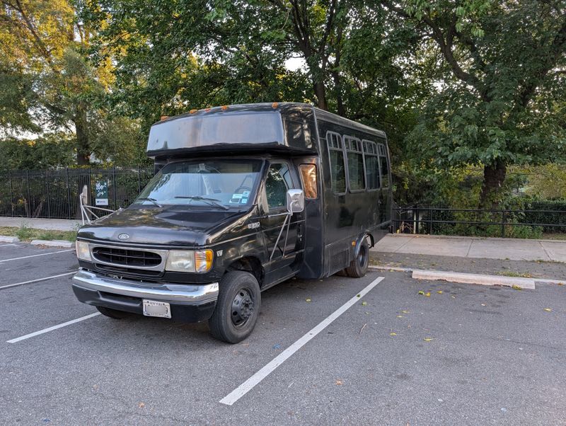 Picture 1/9 of a 1999 Ford E-350 Shuttle Bus Skoolie Conversion – Turnkey for sale in Corona, New York