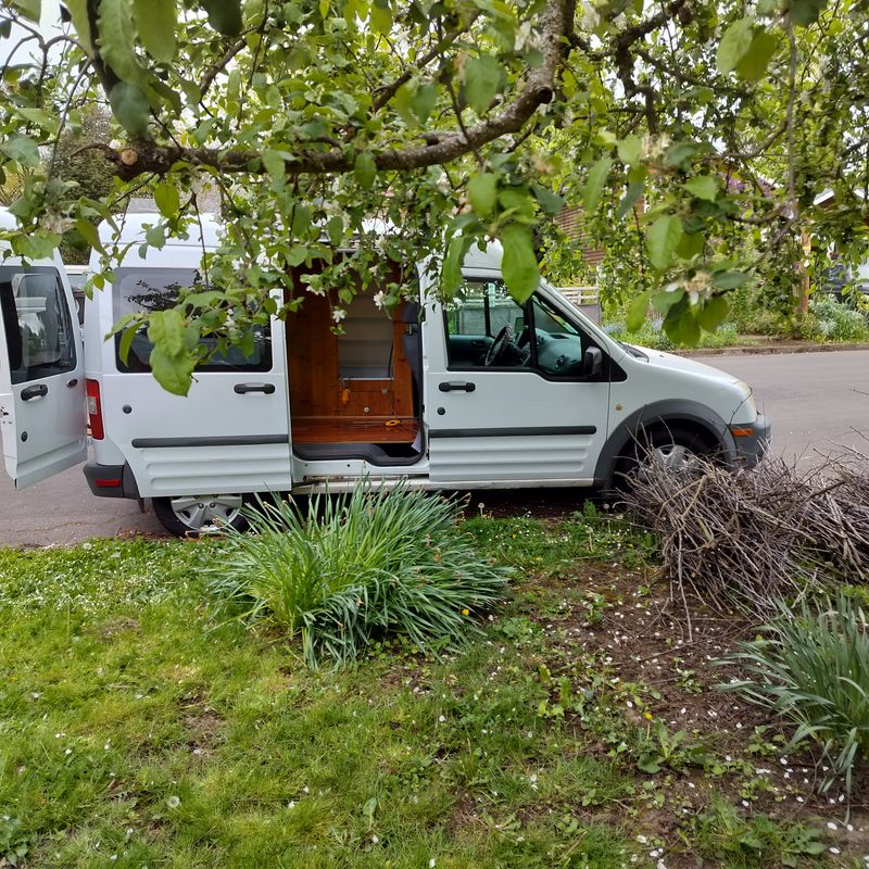 Picture 1/12 of a 2010 low miles Transit Connect camper van for sale in Eugene, Oregon