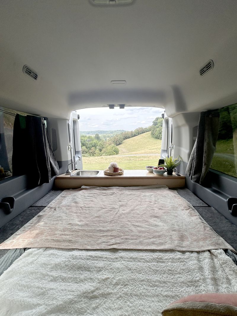 Picture 5/10 of a 2016 Ford Transit 150 Midroof Conversion for sale in Maidsville, West Virginia