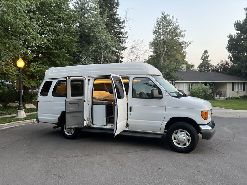 Picture 1/16 of a Converted 2006 Ford E350 for sale in Salt Lake City, Utah