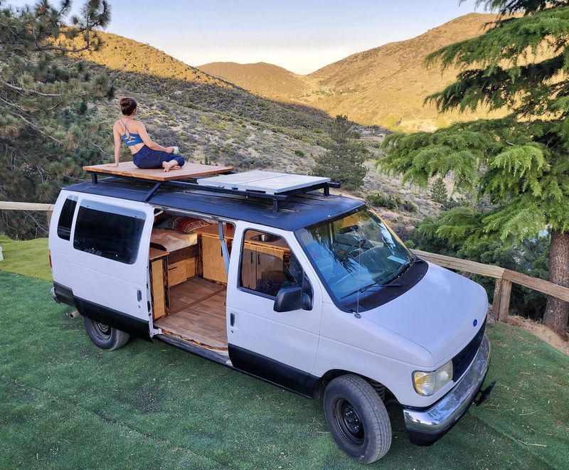 Picture 1/7 of a Ford E-150 Van Conversion w/ roof deck and solar LOW MILES for sale in Los Angeles, California