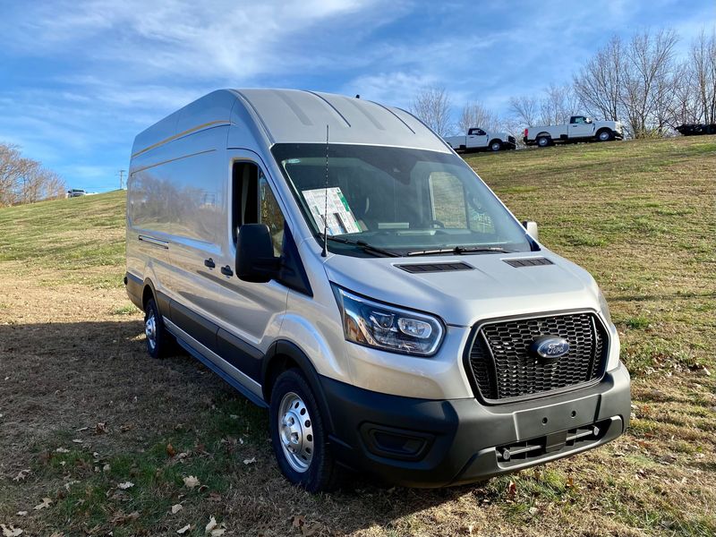 Picture 1/4 of a 2023 NEW Ingot Silver AWD Ford Transit 250 High-Roof EXT for sale in Fayetteville, Arkansas