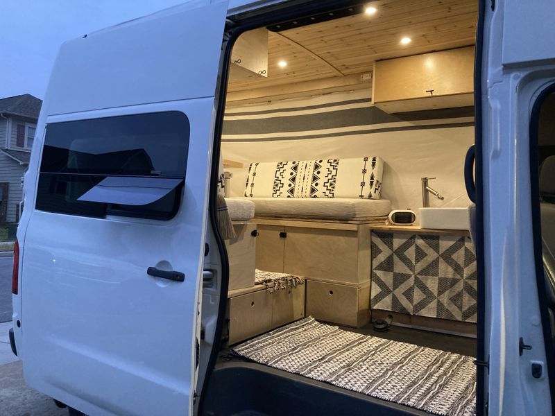 Picture 1/21 of a 2014 Nissan NV2500 HD camper van conversion for sale in Nashville, Tennessee