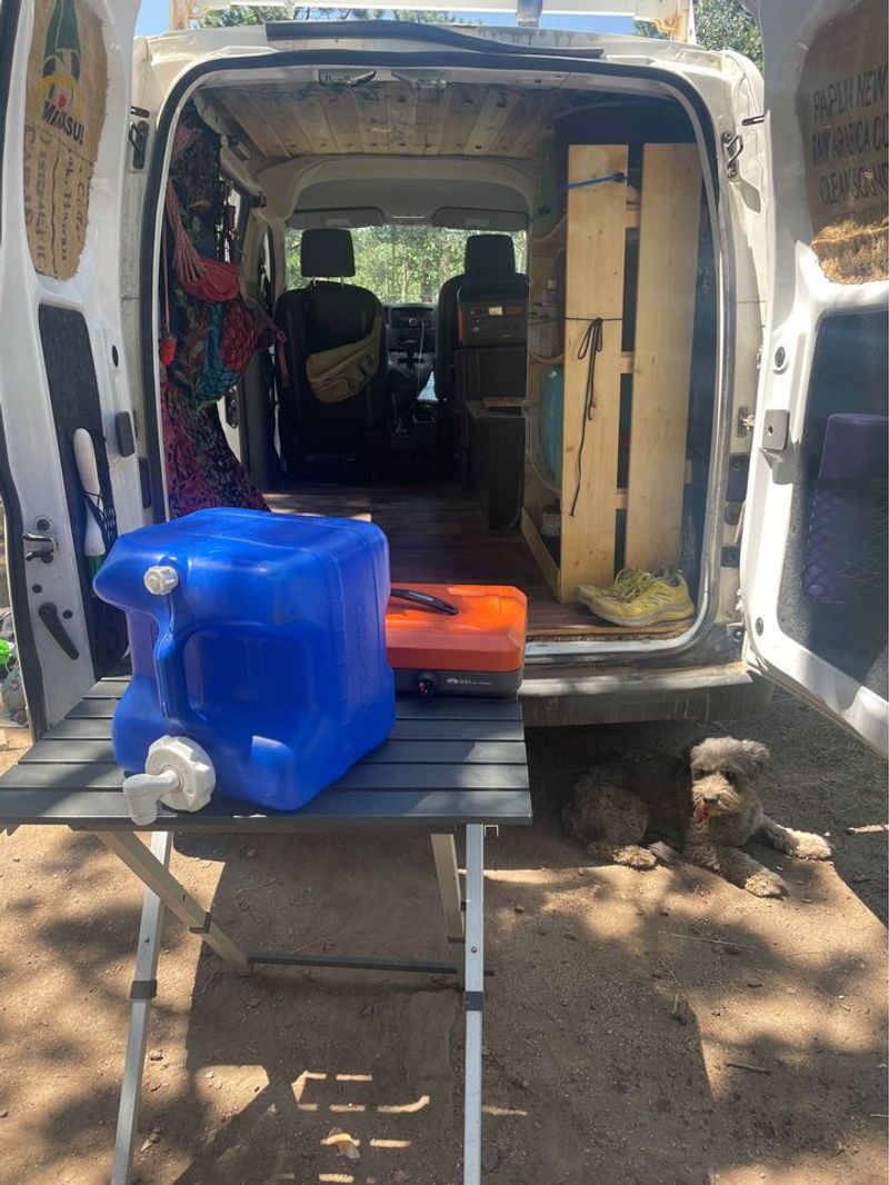 Picture 3/18 of a Nissan NV microcamper with solar for sale in Boulder, Colorado