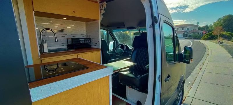 Picture 4/10 of a 2015 Sprinter Van | HOT SHOWER | MERPHY BED | LOADED for sale in Concord, California