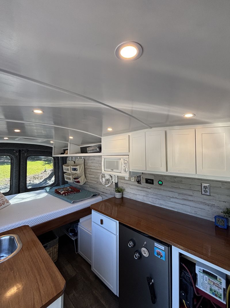 Picture 1/27 of a 2018 Ford 150 Van - with Sink, Full Bed, and Kitchenette! for sale in Fairhope, Alabama