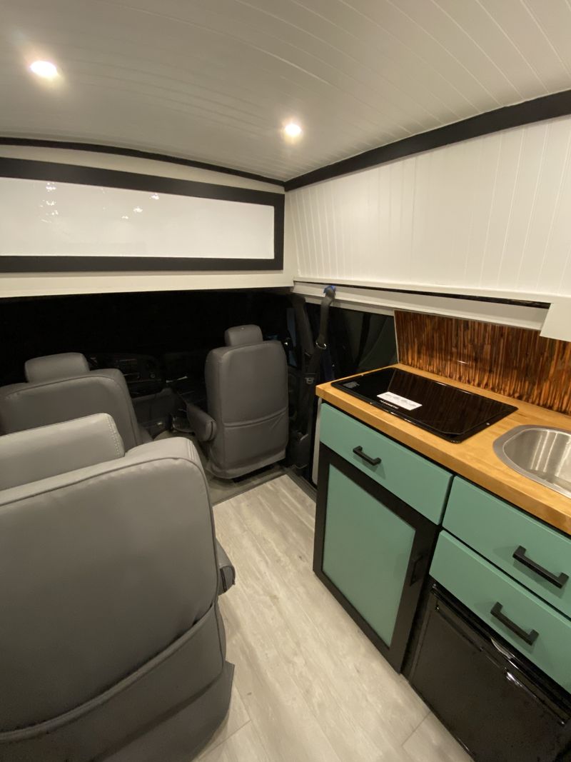Picture 2/18 of a 1996 Ford E-350 XL Super Wagon with fiberglass high top for sale in Clemmons, North Carolina