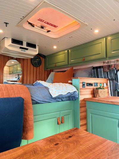Photo of a Camper Van for sale: Charming Converted Off-Grid Shuttle Bus