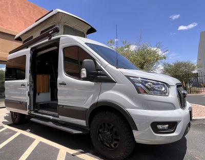Photo of a Camper Van for sale: 2021 Transit 148 MidRoof - Sportsmobile Conversion