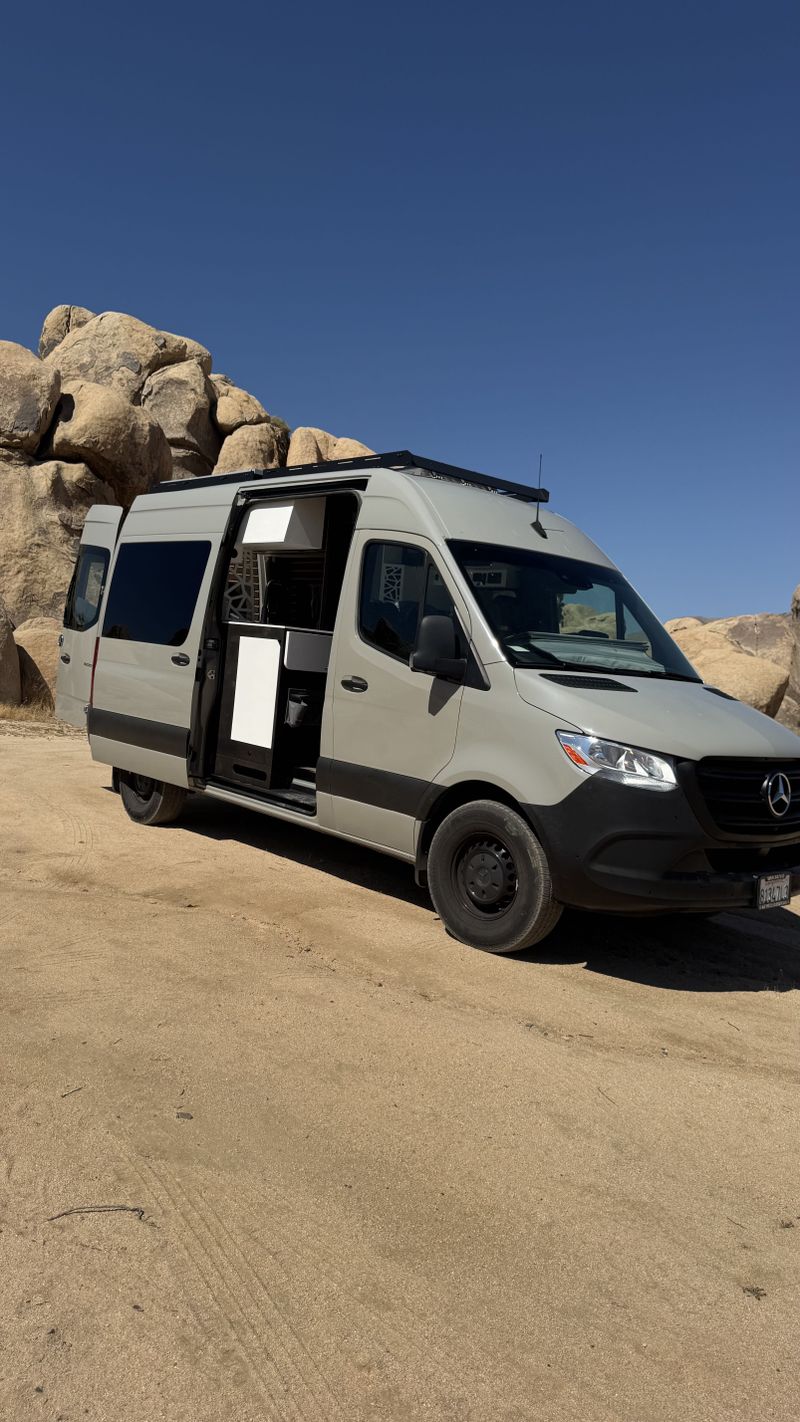 Picture 1/30 of a 144 Sprinter van / warranty / shower / sits 5 / bed lift for sale in Big Bear City, California