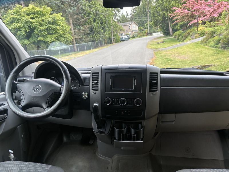 Picture 1/16 of a 2011 sprinter 170 RWD camper, seats 6, sleeps 4 for sale in Seattle, Washington