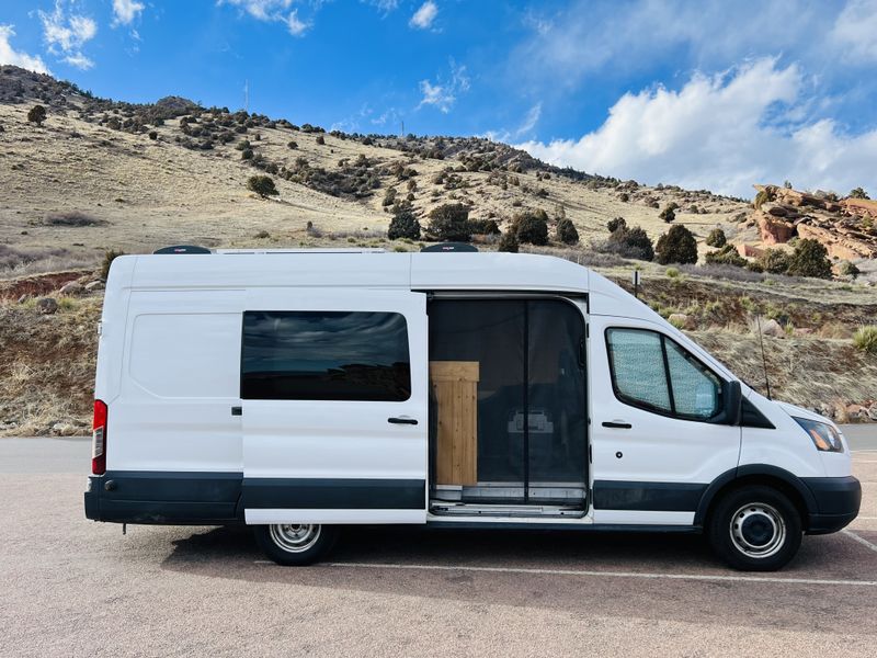 Picture 1/15 of a 2015 FORD TRANSIT 250 EXT/HIGH ROOF FULLY CONVERTED for sale in Arvada, Colorado