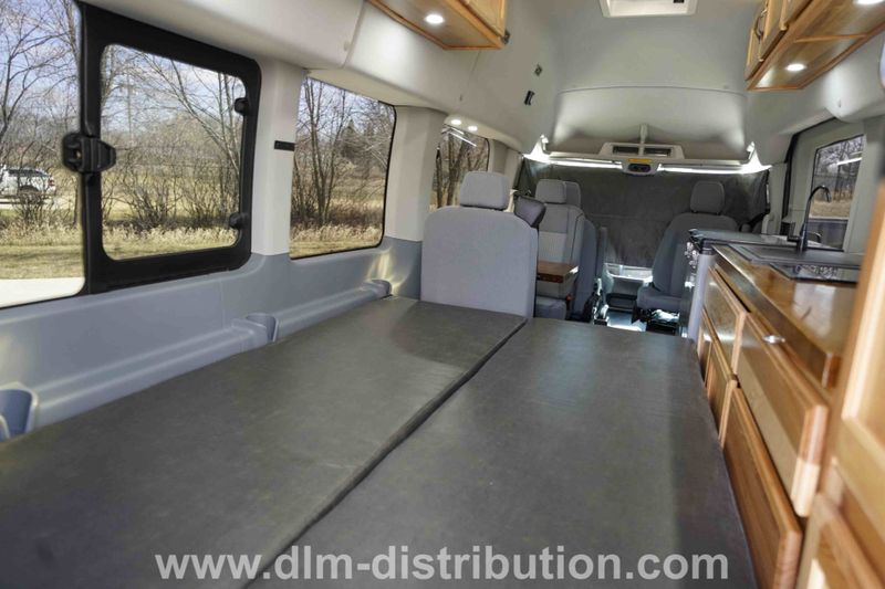 Picture 3/8 of a 2016 Class B DLM Camper Van: Ford Transit High Roof for sale in Lake Crystal, Minnesota
