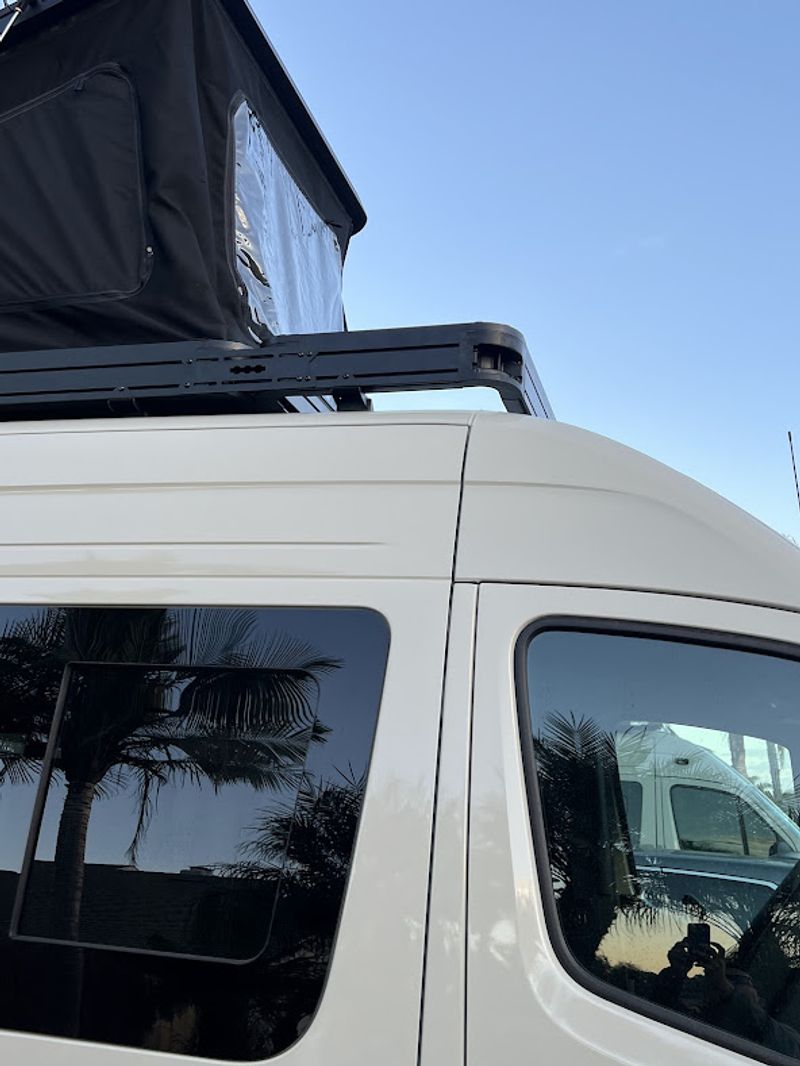 Picture 5/32 of a 2024 AWD Sprinter Crew Pop Top seats up 8, sleeps 4 for sale in Encinitas, California