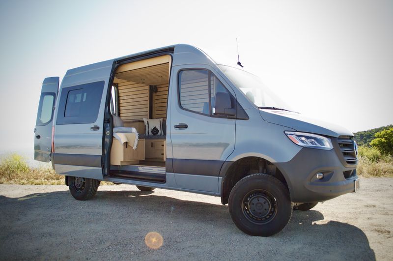 Picture 1/21 of a Custom 4x4 Sprinter with bed lift for sale in Newport Beach, California