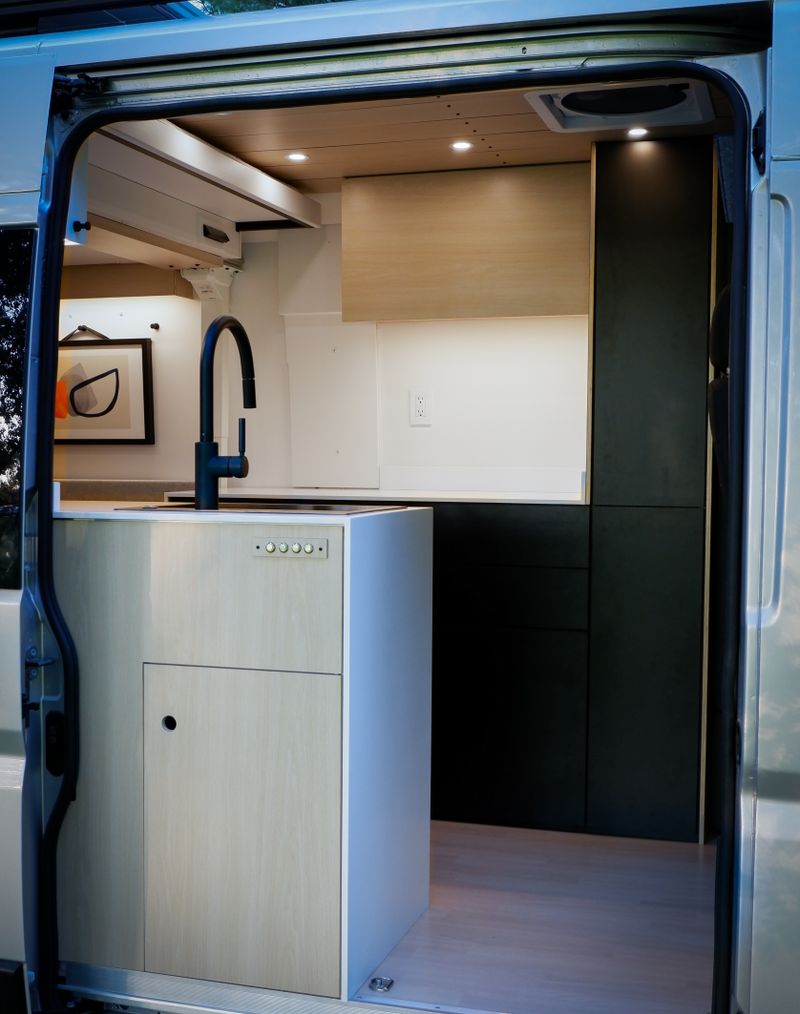 Picture 4/20 of a 2023 Promaster by Roamer Vans: modern design + elevator bed for sale in Rockville, Maryland