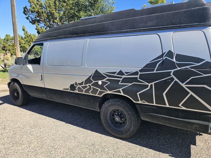 Picture 1/23 of a 1994 E350 full conversion off grid camper van for sale in Cedar City, Utah