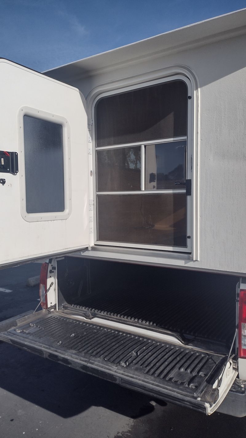 Picture 3/15 of a 2005 Nissan Frontier with 660lb ultralight camper, great MPG for sale in Sarasota, Florida