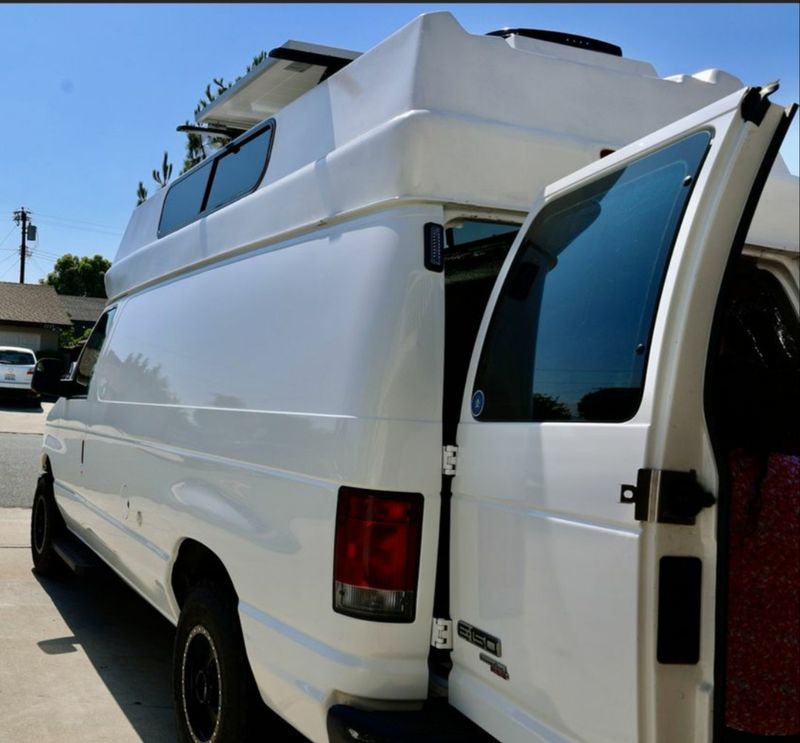 Picture 2/19 of a White 2012 Ford E-150 Series Van with topper, 4.6L V8 for sale in Henderson, Nevada