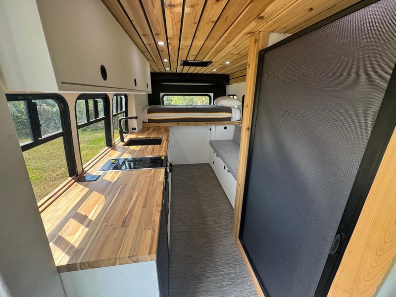 Picture 2/17 of a 2012 Ford Econoline Skoolie Professional Build for sale in Miami, Florida