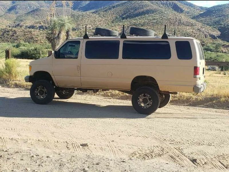 Picture 1/8 of a 1999 Ford E350 4x4 for sale in Apache Junction, Arizona