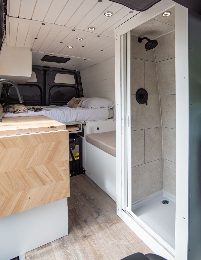 Picture 5/12 of a 2021 Mercedes Sprinter 4x4 144 with indoor shower for sale in Portland, Oregon