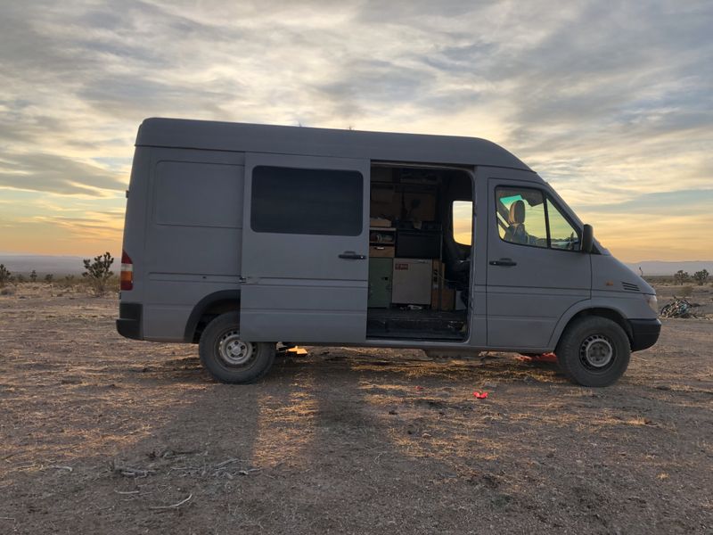 Picture 1/25 of a Camper Van for sale: kitchen, queen bed, table, storage for sale in Salt Lake City, Utah